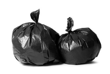 Trash bags full of garbage isolated on white