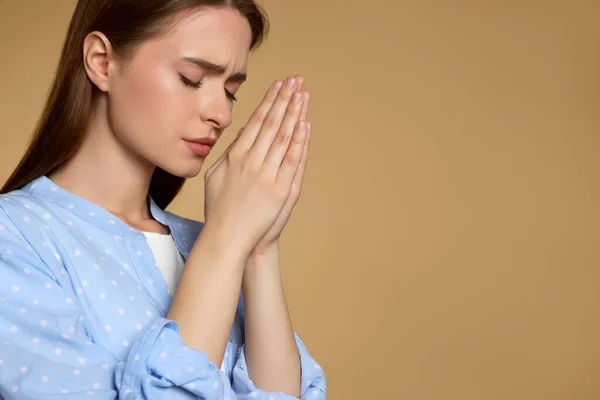 Woman Clasped Hands Praying Beige Background Space Text — Stockfoto