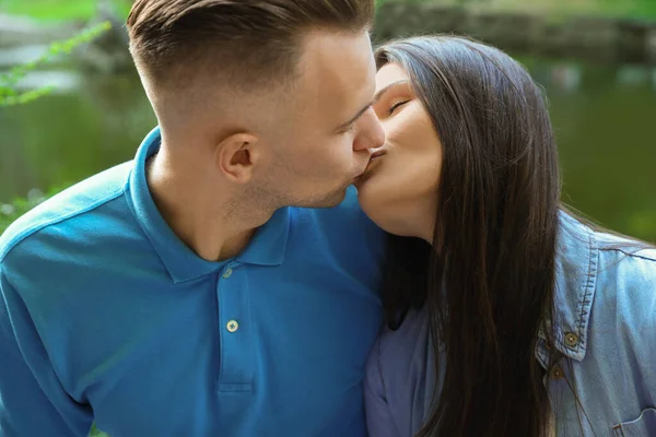 Affectionate Young Couple Kissing Park Closeup — Photo