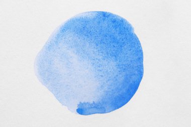 Blot of blue watercolor paint on white background, top view