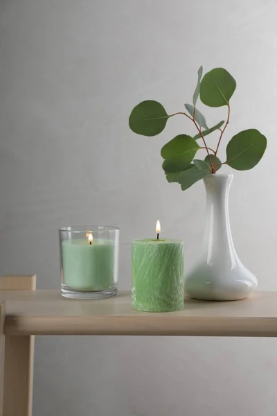 Scented Candles Vase Eucalyptus Branch Wooden Table — Stock Photo, Image