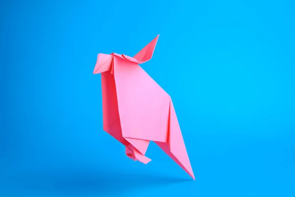 Origami Art Handmade Pink Paper Parrot Light Blue Background — Stockfoto