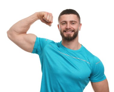 Handsome man showing muscles on white background