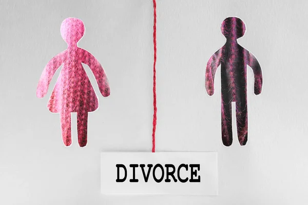 Word Divorce Man Woman Silhouettes View Holes White Paper — стоковое фото