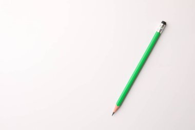 Sharp graphite pencil with eraser on white background, top view. Space for text