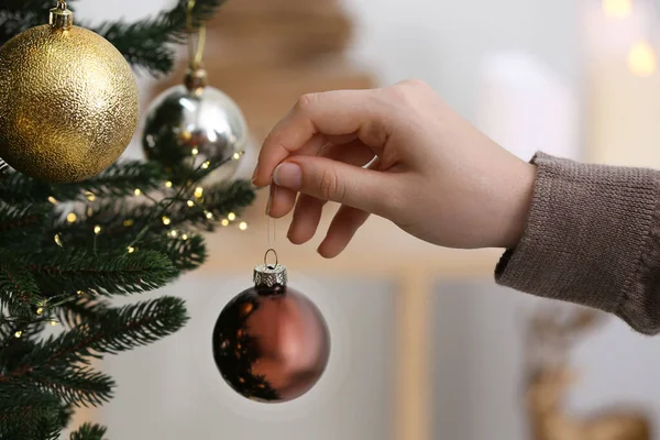 Woman Holding Brown Ball Christmas Tree Indoors Closeup — Fotografia de Stock