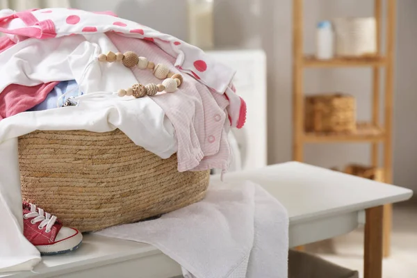 Laundry Basket Baby Clothes White Table Indoors — 스톡 사진