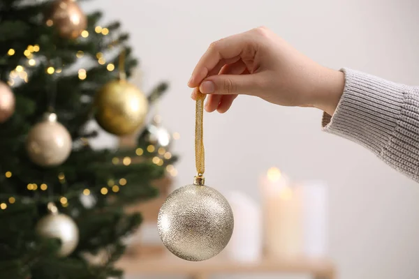 Woman Holding Shiny Ball Christmas Tree Indoors Closeup — Fotografia de Stock