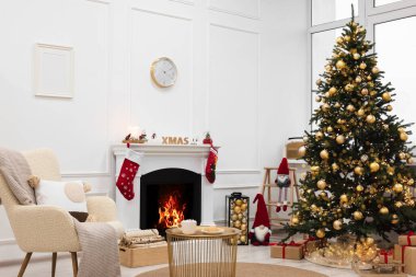 Living room interior with beautiful Christmas tree and festive decor