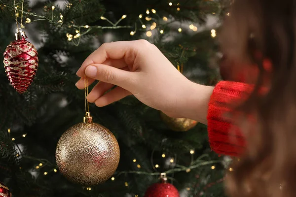 Woman Decorating Christmas Tree Beautiful Bauble Closeup — Fotografia de Stock