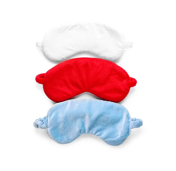 Three Soft Sleep Masks Isolated White Top View — стоковое фото