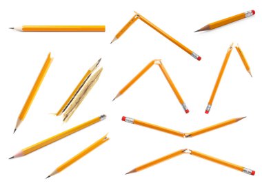 Set with whole and broken pencils on white background