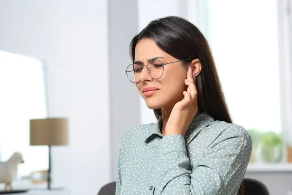 Young Woman Eyeglasses Suffering Ear Pain Indoors — Stok fotoğraf