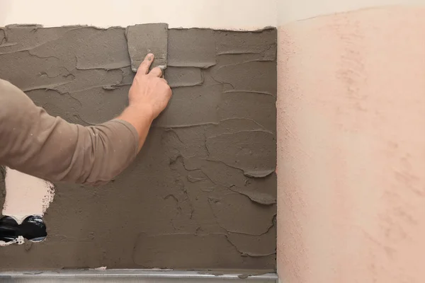 Worker Spreading Adhesive Mix Installing Tile Wall Indoors Closeup — Fotografia de Stock
