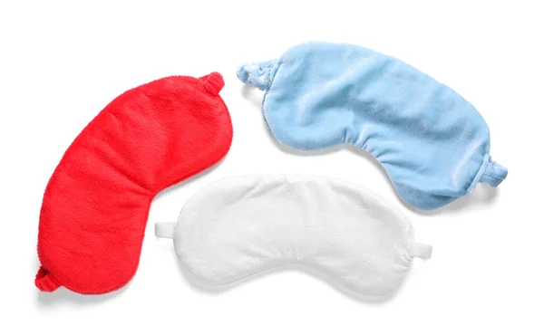 Three Soft Sleep Masks Isolated White Top View — стоковое фото