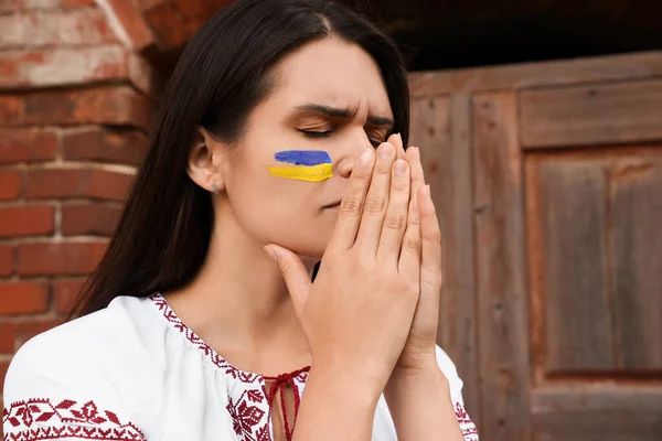 Sad Young Woman Drawing Ukrainian Flag Face Outdoors Space Text — Stockfoto