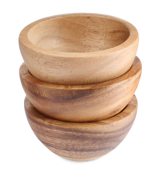 Set of wooden bowls on white background