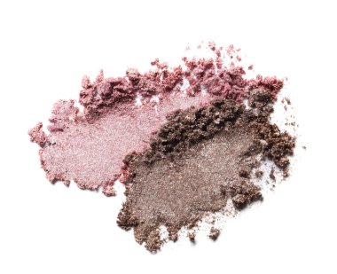 Crushed eye shadows on white background, top view. Professional makeup product
