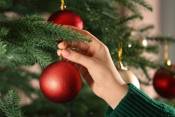 Woman Decorating Christmas Tree Beautiful Red Bauble Closeup — Fotografia de Stock