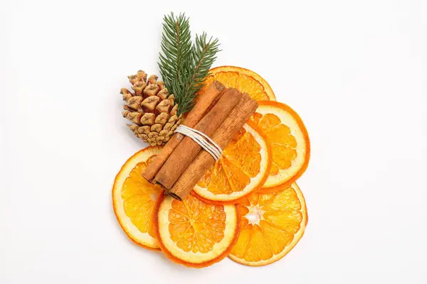 Dry Orange Slices Cinnamon Sticks Fir Branches Cone White Background — Fotografia de Stock