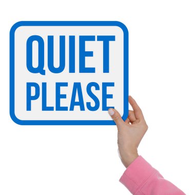 Woman holding Quiet Please sign on white background, closeup