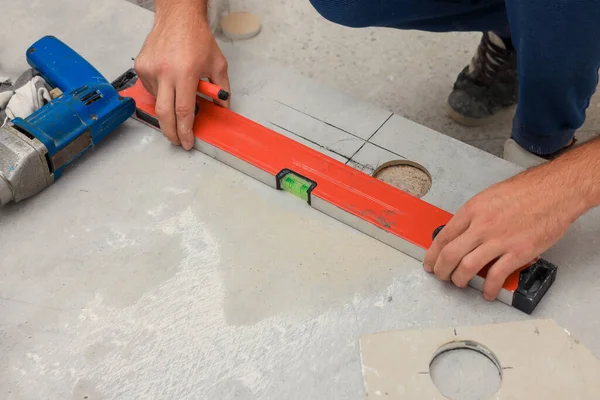 Worker Making Socket Hole Tile Indoors Closeup — Fotografia de Stock