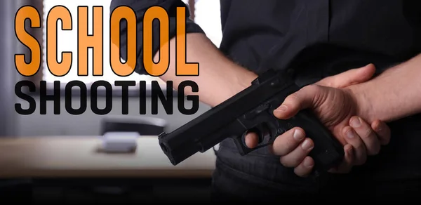 School shooting. Man holding gun indoors, closeup