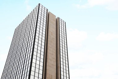 Beautiful view of skyscraper with big windows against sky