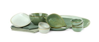 Different stylish empty dishware on white background