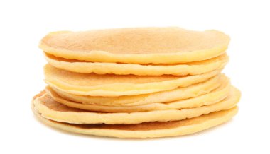 Stack of tasty corn pancakes isolated on white