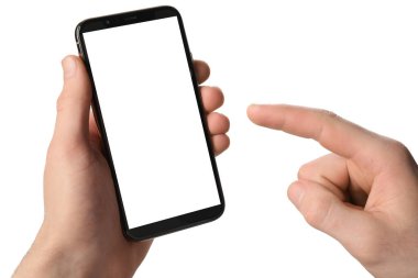 Man holding smartphone with blank screen on white background. Mockup for design