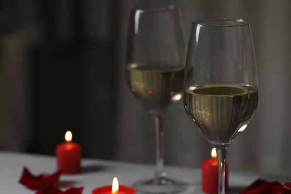 Glasses White Wine Burning Candles Grey Table Blurred Background Space — Stock Fotó