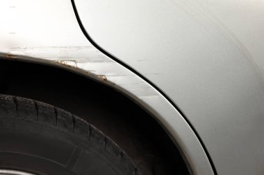 Modern gray car with scratch, closeup view