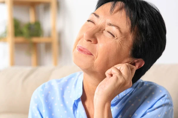 Senior Woman Suffering Ear Pain Home Closeup Space Text — Photo