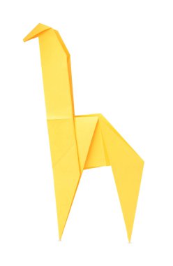 Origami art. Handmade yellow paper giraffe isolated on white