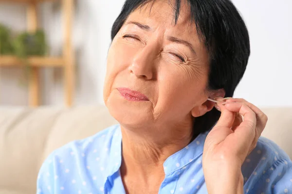 Senior Woman Cleaning Ear Cotton Swab Home Closeup — Photo