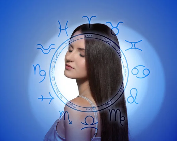 Beautiful young woman and zodiac wheel illustration on blue background
