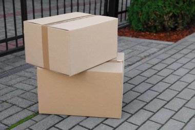 Stack of parcels delivered near front gates