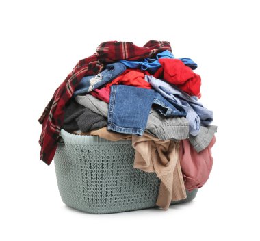 Plastic laundry basket full of clothes isolated on white