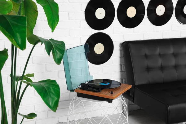 Living room decorated with vinyl records. Interior design