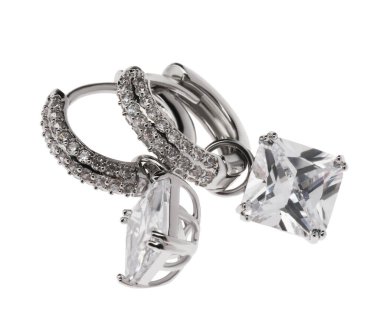 Luxury earrings on white background. Elegant jewelry