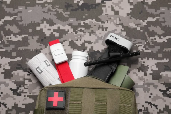 First Aid Kit Medical Tourniquet Pills Bands Military Fabric Flat — Foto de Stock