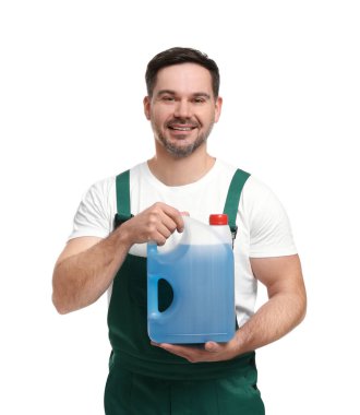 Man holding canister with blue liquid on white background