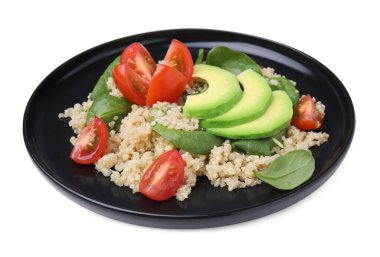 Delicious quinoa salad with tomatoes, avocado slices and spinach leaves isolated on white