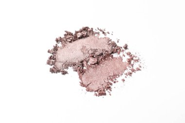 Crushed eye shadows on white background. Professional makeup product