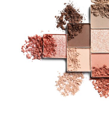 Crushed eye shadows on white background, flat lay with space for text. Professional makeup product