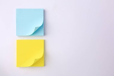 Blank paper notes on white background, flat lay. Space for text