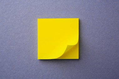 Blank paper note on color background, top view