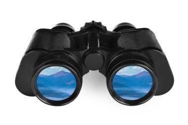 Binoculars on white background. Mountain landscape reflecting in lenses