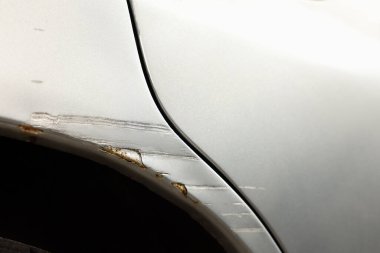 Modern gray car with scratch, closeup view